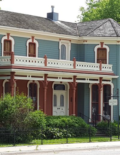 front of Victorian home with blue paint