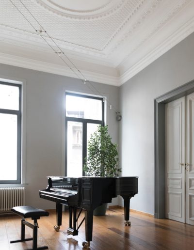 living area with grand piano