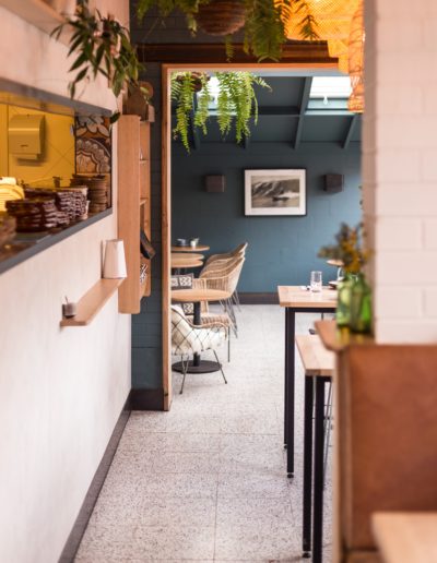 coffee shop kitchen window and dining area